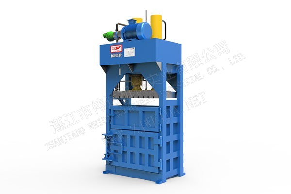 Fiber baling machine